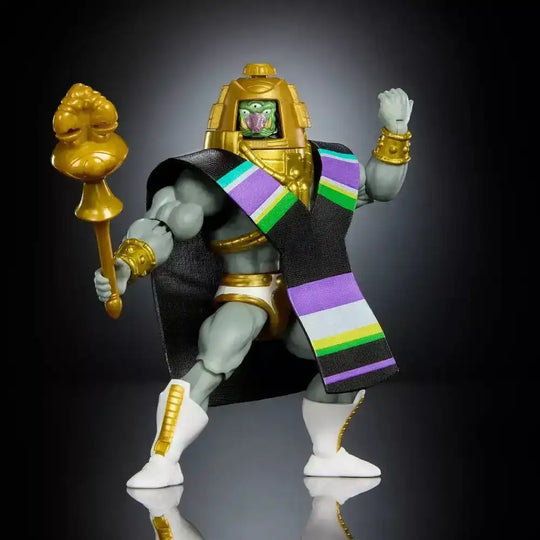 Masters of the Universe Actionfigur mit goldener Rüstung, Zepter und Umhang auf schwarzem Hintergrund
